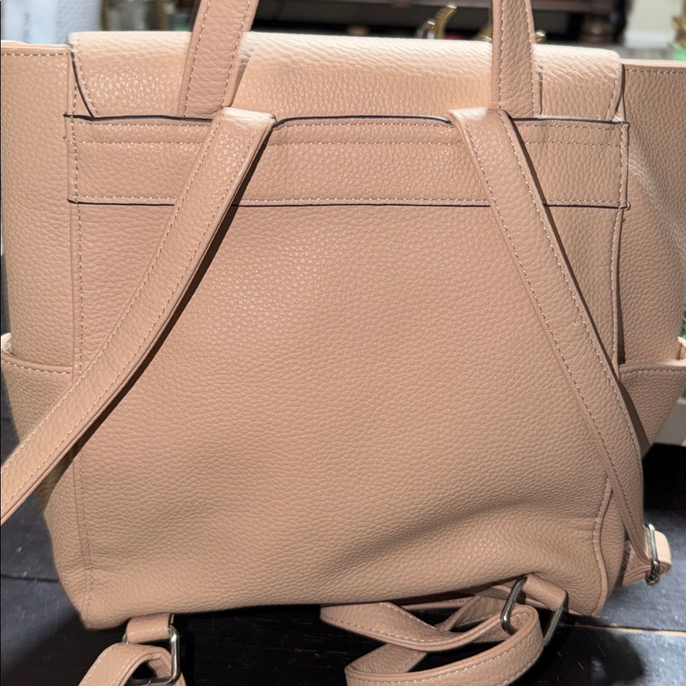 Nanette Lepore pebbled vegan leather backpack in a light pink or beige color. - Picture 7 of 9